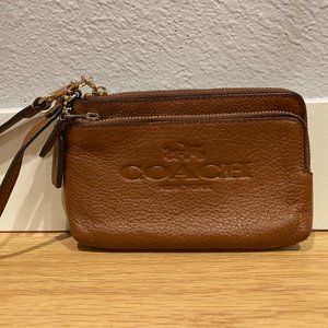 Brown Coach zip wristlet
